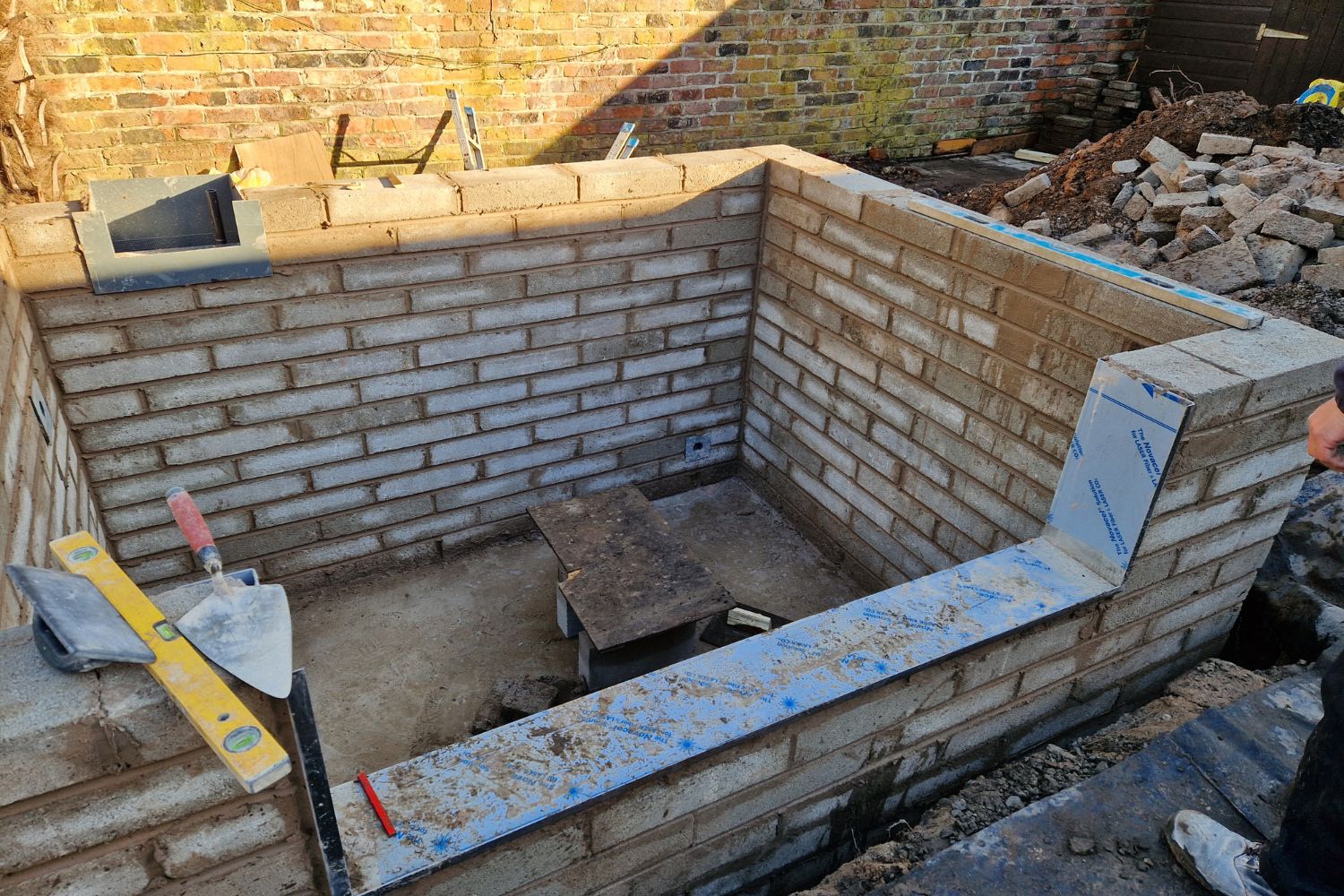 raised contemporary pond with window eccles 3