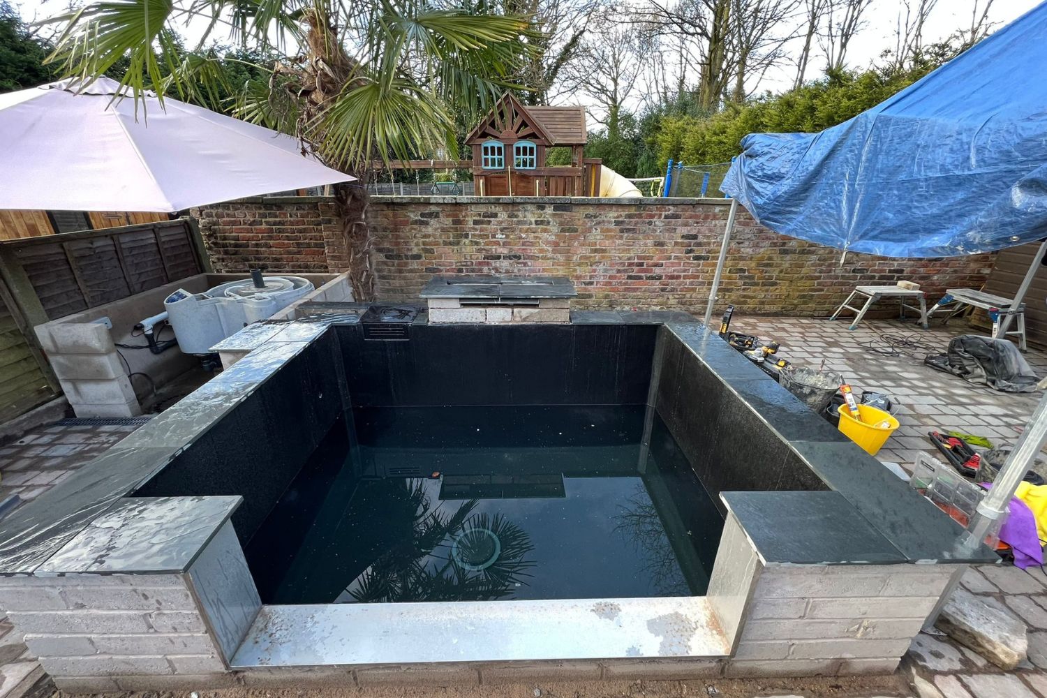 raised contemporary pond with window eccles 5