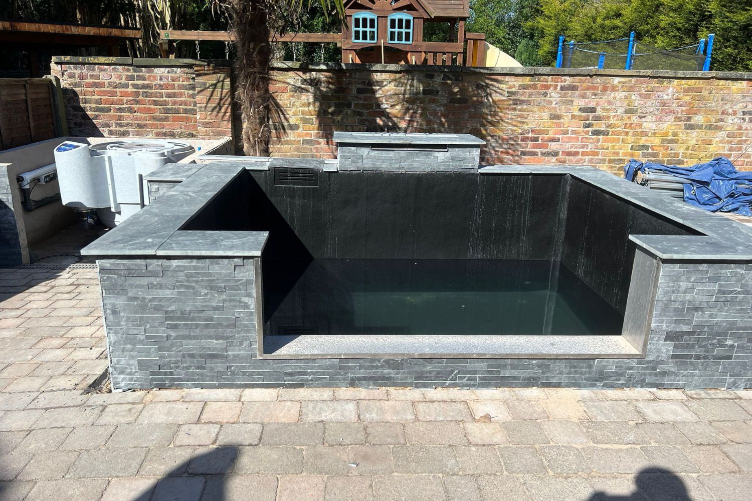 raised contemporary pond with window eccles 7